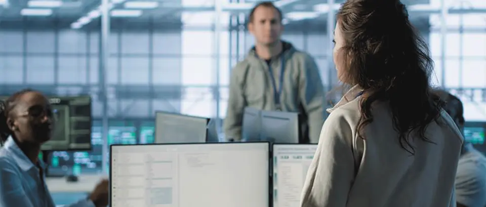 IT manager discussing data center green tips with staff